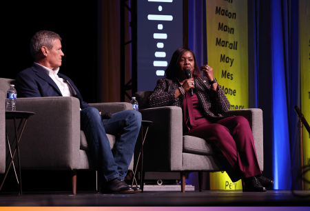 TNWorks-04 With Governor Bill Lee looking on, Commissioner Deniece Thomas speaks into a microphone while sitting in a chair on a stage