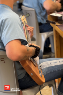 Offender Playing a Guitar Photo of Offender Playing a Guitar