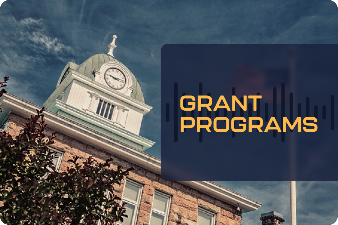 Grant Programs Old building with the text "Grant Programs" overlaid