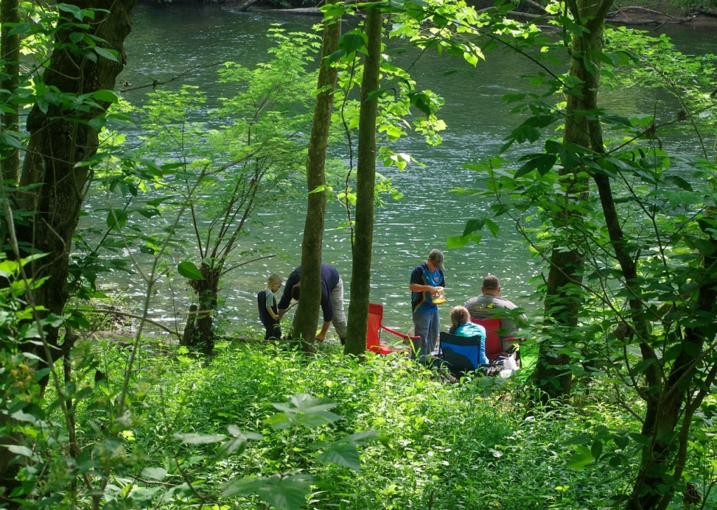 A family enjoys fishing and eating by Powell River