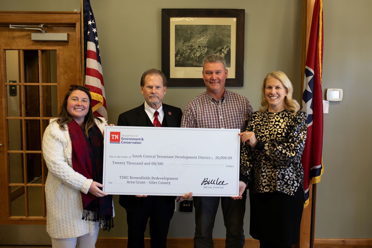 The Tennessee Department of Conservation presented a check for $20,000 for Giles County for brownfield redevelopment. From left are Amy Dyman, coordinator of the Brownfield Redevelopment Area Grant program; Sen. Joey Hensley, R-Hohenwald; Graham Stowe, county executive for Giles County; and Lisa Cross, coordinator of the Brownfield Redevelopment Area Grant program.