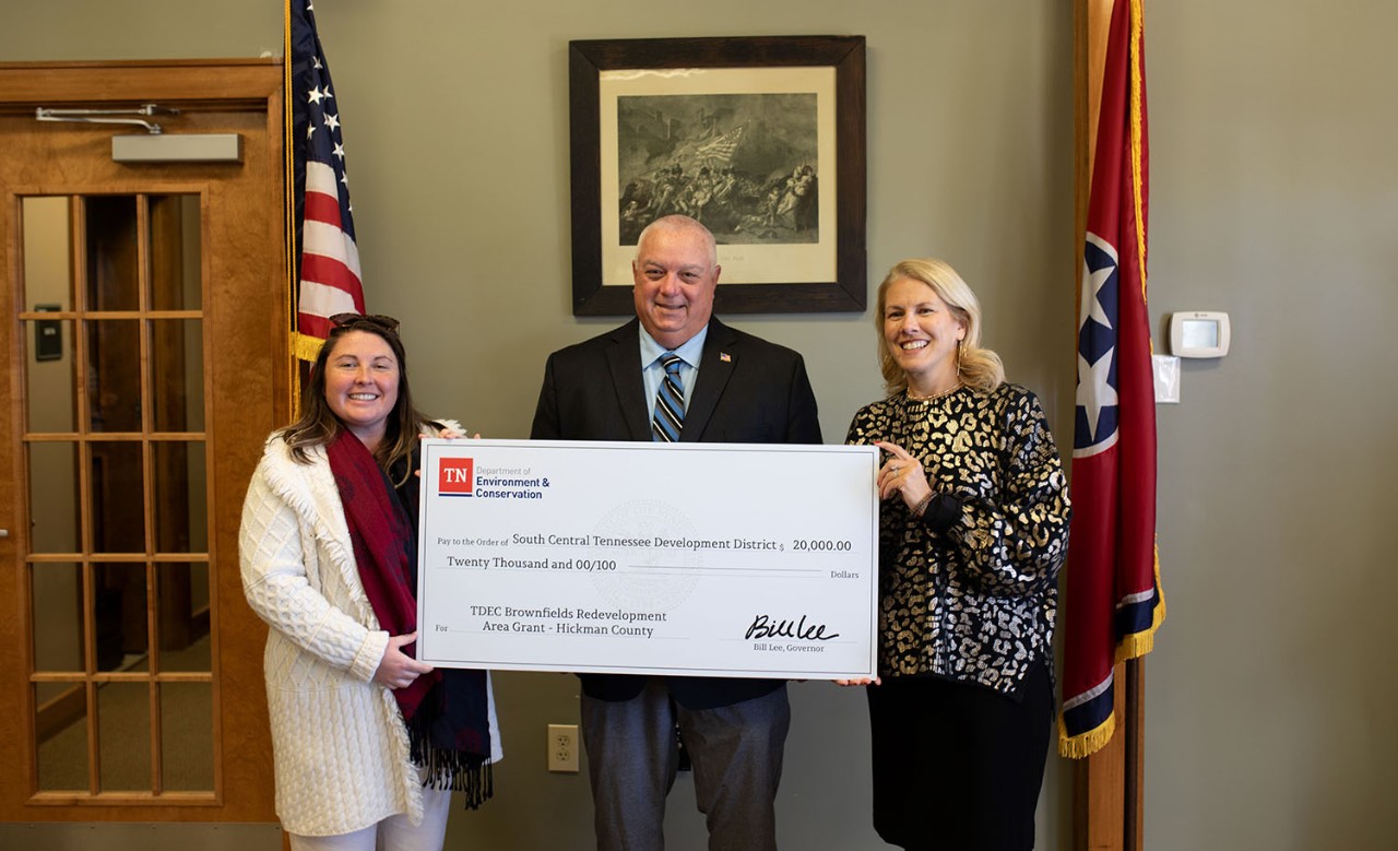 The Tennessee Department of Environment and Conservation presented a check for $20,000 to Hickman County for brownfield redevelopment. From left are Amy Dyman, coordinator of the Brownfield Redevelopment Area Grant program; Jim Bates, mayor of Hickman County; and Lisa Cross, director of Rural Planning Organization/Infrastructure for the South Central Tennessee Development District.