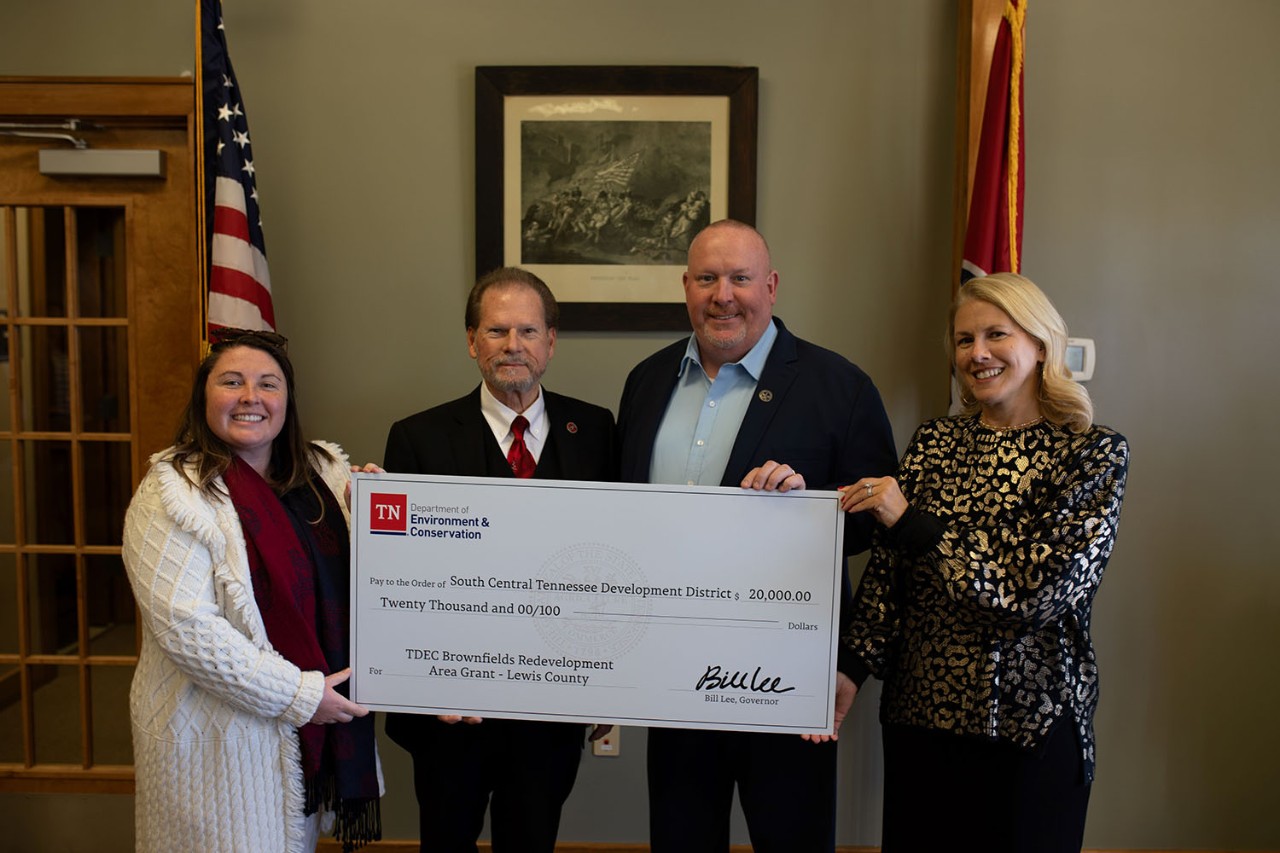 The Tennessee Department of Environment and Conservation presents a check for $20,000 to Lewis County for brownfield redevelopment. From left are Amy Dyman, coordinator of the Brownfield Redevelopment Area Grant program; Sen. Joey Hensley, R-Hohenwald; Lewis County Mayor Jonah Keltner; and Lisa Cross, director of Rural Planning Organization/Infrastructure for the South Central Tennessee Development District.