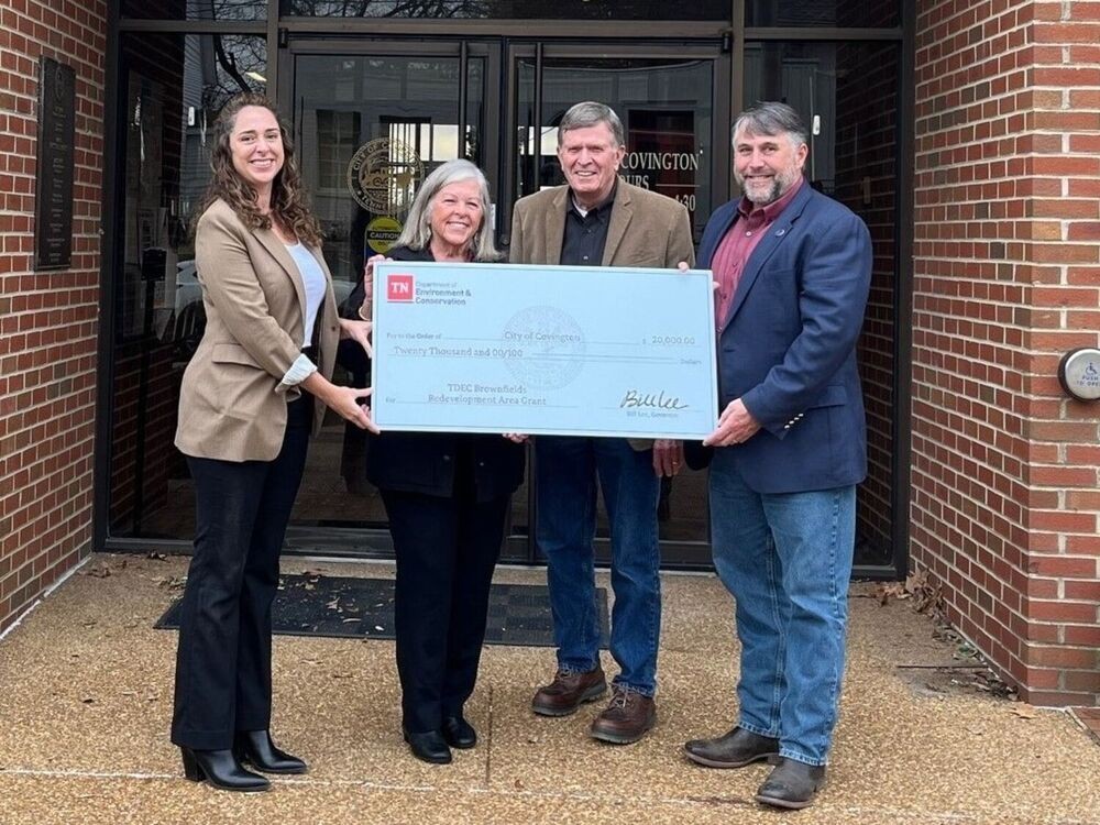 The Tennessee Department of Environment and Conservation (TDEC) presents a check for $20,000 to Covington for its plans in brownfield redevelopment. From left are Kathryn Schulte, regional director of External Affairs at TDEC; Rep. Debra Moody, R-Covington; Sen. Paul Rose, R-Covington; and Covington Mayor Jan Hensley.