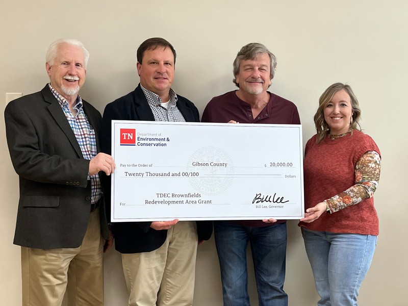 The Tennessee Department of Environment and Conservation (TDEC) presents a check for $20,000 to Gibson County for its plans in brownfield redevelopment. From left are Rudy Collins, regional director for External Affairs at TDEC; Nelson Cunningham, Gibson County mayor; Kingsley Brock, director of Economic Development for Gibson County; and Leslie Milligan, director of finance for Gibson County.