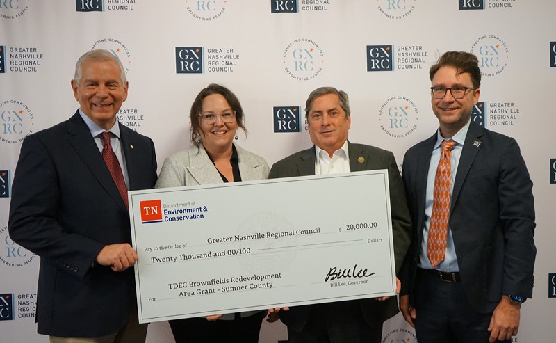 The Tennessee Department of Environment and Conservation (TDEC) presents a check for $20,000 to Sumner County for its plans in brownfield redevelopment. From left are Joe Pitts, mayor of Clarksville and chairman of the Greater Nashville Regional Council; Tara Pedraza, director of Stakeholder Engagement for the Tennessee Department of Environment and Conservation; John Isbell, mayor of Sumner County; and Michael Skipper, executive director of the Greater Nashville Regional Council.