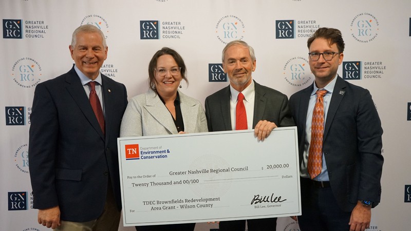 The Tennessee Department of Environment and Conservation (TDEC) presents a check for $20,000 to Wilson County for its plans in brownfield redevelopment. From left are Joe Pitts, mayor of Clarksville and chair of the Greater Nashville Regional Council; Tara Pedraza, director of Stakeholder Engagement for TDEC; Randall Hutto, mayor of Wilson County; and Michael Skipper, executive director of the Greater Nashville Regional Council.