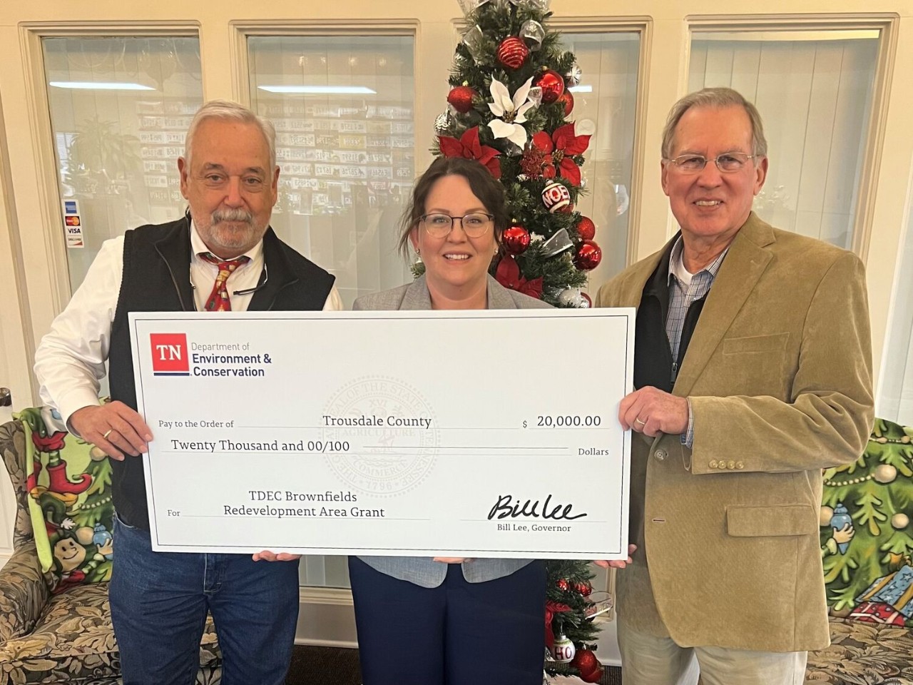The Tennessee Department of Environment and Conservation (TDEC) presents a check for $20,000 to Trousdale County for its plans in brownfield redevelopment. From left are Jack McCall, Hartsville-Trousdale County mayor; Tara Pedraza, director of Stakeholder Engagement at TDEC; and Sen. Ferrell Haile, R-Gallatin.