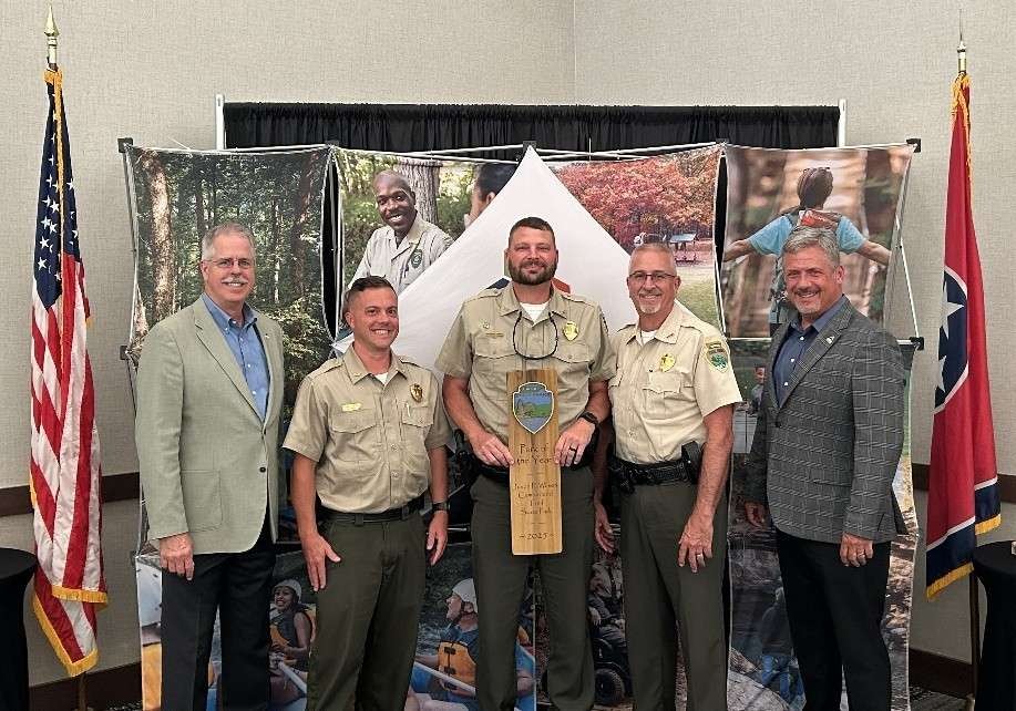 Justin P. Wilson Cumberland Trail State Park receives the Park of the Year Award in the Tennessee State Parks annual Awards of Excellence. From left are Greer Tidwell, deputy commissioner for Conservation at the Tennessee Department of Environment and Conservation; Kenny Gragg, Area 4 manager, Tennessee State Parks; Anthony Jones, park manager, Cumberland Trail State Park; Kim Moore, director of operations, Tennessee State Parks; and Chris Padgett, chief of staff and parks administrator. Justin P. Wilson Cumberland Trail State Park receives the Park of the Year Award in the Tennessee State Parks annual Awards of Excellence. From left are Greer Tidwell, deputy commissioner for Conservation at the Tennessee Department of Environment and Conservation; Kenny Gragg, Area 4 manager, Tennessee State Parks; Anthony Jones, park manager, Cumberland Trail State Park; Kim Moore, director of operations, Tennessee State Parks; and Chris Padgett, chief of staff and parks administrator.