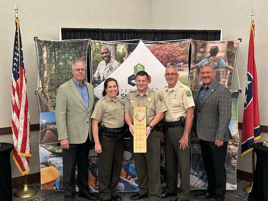 Panther Creek State Park receives the Excellence in Amenities Award in the Tennessee State Parks annual Awards of Excellence. From left are Greer Tidwell, deputy commissioner for Conservation at TDEC; Veronica Greear, Area 6 manager, Tennessee State Parks; Jason Chadwell, park manager, Panther Creek State Park; Kim A. Moore, director of operations, Tennessee State Parks; and Christopher Padgett, chief of staff and parks administrator. Panther Creek State Park receives the Excellence in Amenities Award in the Tennessee State Parks annual Awards of Excellence. From left are Greer Tidwell, deputy commissioner for Conservation at TDEC; Veronica Greear, Area 6 manager, Tennessee State Parks; Jason Chadwell, park manager, Panther Creek State Park; Kim A. Moore, director of operations, Tennessee State Parks; and Christopher Padgett, chief of staff and parks administrator.