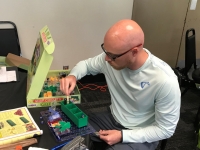 Person with an Alternative Energy Green Snap Circuit Kit Person with an Alternative Energy Green Snap Circuit Kit