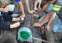 Children Work on Hydropower Water Wheel Children Work on Hydropower Water Wheel