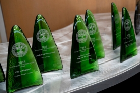 Photo of multiple awards sitting on a table Photo of multiple awards sitting on a table