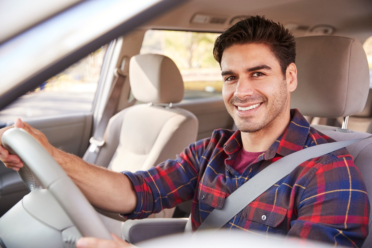1030960752 Man Driving A Car