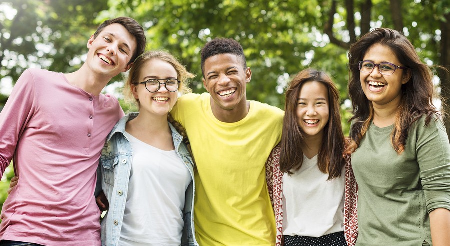 Diverse Group Young People Bonding Outdoors Concept