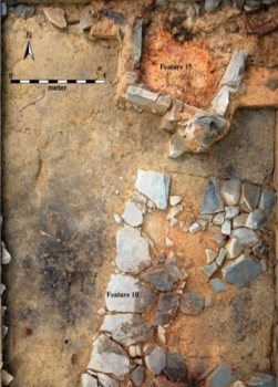 Fort Armistead Archaeological excavation area showing two labeled features composed of stone fragments.