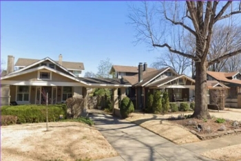 Residential street in Memphis, TN Residential street in Memphis with three one-story Craftsman style homes in Memphis, TN