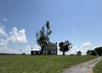 Rural Mount in Hamblen County, TN Image of a stone house with a tree in front of in, known as Rural Mount in Hamblen County, TN