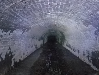 Former Fire Station in Memphis, TN Long, arched underground tunnel constructed of brick belonging to a former fire station in Memphis, TN