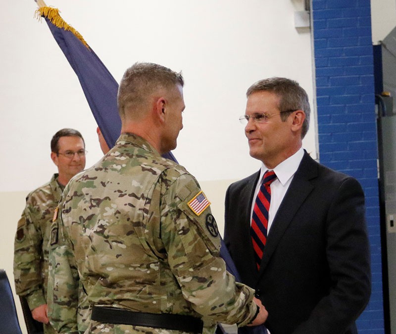 Maj. Gen. Jeff Holmes, Tennessee’s 76th Adjutant General, receives the Military Department flag from Tennessee Governor Bill Lee during a change of command ceremony at the Joint Force Headquarters in Nashville on March 3, 2019. (U.S. Army photograph courtesy of Staff Sgt. Mathieu Perry) Maj. Gen. Jeff Holmes, Tennessee’s 76th Adjutant General, receives the Military Department flag from Tennessee Governor Bill Lee during a change of command ceremony at the Joint Force Headquarters in Nashville on March 3, 2019. (U.S. Army photograph courtesy of Staff Sgt. Mathieu Perry)