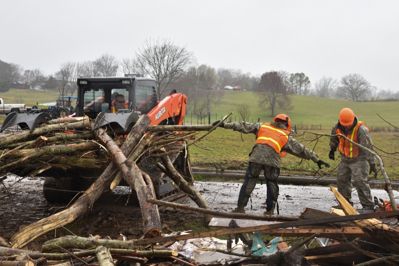 Tennessee Guard Clears Debris in Putnam County Soldiers clearing debris from a roadway
