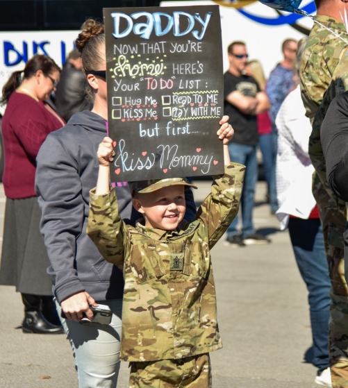 Families, friends and fellow service members gathered to greet Tennessee National Guardsmen as they return home from a year-long deployment, Oct. 27, at Smyrna’s Volunteer Training Site. Members of the 913th Engineer Company, 269th Military Police Company, and C Company, 2nd Battalion, 151st Aviation Regiment were deployed supporting operations near Laredo, Texas. (Photo by U.S. Army Sgt. 1st Class Timothy Cordeiro) Families, friends and fellow service members gathered to greet Tennessee National Guardsmen as they return home from a year-long deployment, Oct. 27, at Smyrna’s Volunteer Training Site. Members of the 913th Engineer Company, 269th Military Police Company, and C Company, 2nd Battalion, 151st Aviation Regiment were deployed supporting operations near Laredo, Texas. (Photo by U.S. Army Sgt. 1st Class Timothy Cordeiro)
