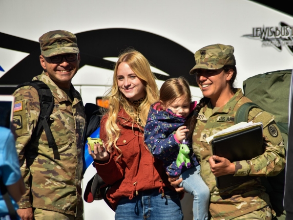 Families, friends and fellow service members gathered to greet Tennessee National Guardsmen as they return home from a year-long deployment, Oct. 27, at Smyrna’s Volunteer Training Site. Members of the 913th Engineer Company, 269th Military Police Company, and C Company, 2nd Battalion, 151st Aviation Regiment were deployed supporting operations near Laredo, Texas. (Photo by U.S. Army Sgt. 1st Class Timothy Cordeiro) Families, friends and fellow service members gathered to greet Tennessee National Guardsmen as they return home from a year-long deployment, Oct. 27, at Smyrna’s Volunteer Training Site. Members of the 913th Engineer Company, 269th Military Police Company, and C Company, 2nd Battalion, 151st Aviation Regiment were deployed supporting operations near Laredo, Texas. (Photo by U.S. Army Sgt. 1st Class Timothy Cordeiro)