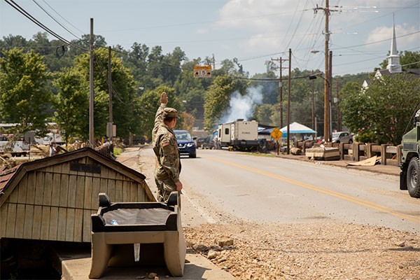 Soldiers from the Tennessee National Guard conduct traffic control operations in Waverly, Aug. 25, following deadly flooding last weekend. More than 80 members of the Tennessee National Guard are in Humphreys County working with state, county, and local emergency personnel, as well as the Tennessee Emergency Management Agency, assisting with traffic control, security, supply distribution, and cleanup operations in the impacted area. (Photo by Sgt. 1st Class Timothy Cordeiro) Soldiers from the Tennessee National Guard conduct traffic control operations in Waverly, Aug. 25, following deadly flooding last weekend. More than 80 members of the Tennessee National Guard are in Humphreys County working with state, county, and local emergency personnel, as well as the Tennessee Emergency Management Agency, assisting with traffic control, security, supply distribution, and cleanup operations in the impacted area. (Photo by Sgt. 1st Class Timothy Cordeiro)