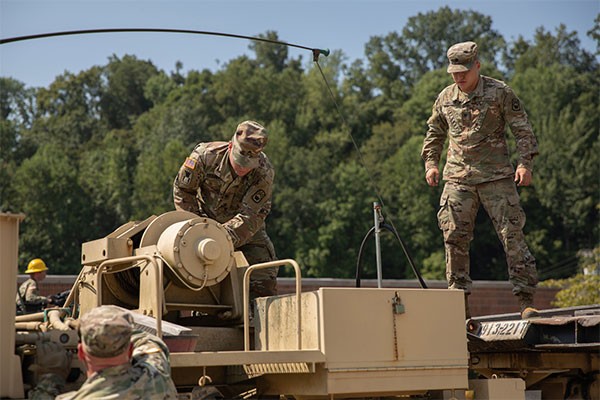 Soldiers from Jackson’s 194th Engineer Brigade conduct cleanup operations in Waverly, Aug. 25, following deadly flooding last weekend. More than 80 members of the Tennessee National Guard are in Humphreys County working with state, county, and local emergency personnel, as well as the Tennessee Emergency Management Agency, assisting with traffic control, security, supply distribution, and cleanup operations in the impacted area. (Photo by Sgt. 1st Class Timothy Cordeiro) Soldiers from Jackson’s 194th Engineer Brigade conduct cleanup operations in Waverly, Aug. 25, following deadly flooding last weekend. More than 80 members of the Tennessee National Guard are in Humphreys County working with state, county, and local emergency personnel, as well as the Tennessee Emergency Management Agency, assisting with traffic control, security, supply distribution, and cleanup operations in the impacted area. (Photo by Sgt. 1st Class Timothy Cordeiro)