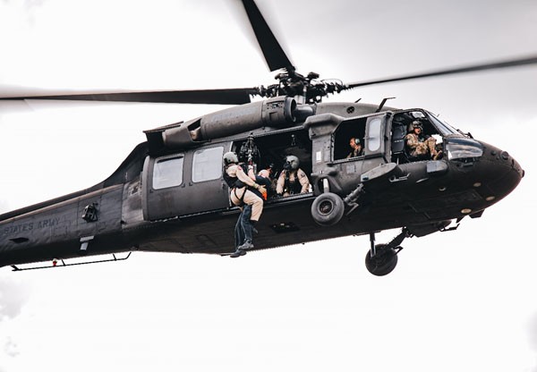 Members of the Tennessee National Guard and the Nashville Fire Department’s Helicopter Aquatic Rescue Team take part in a rescue exercise, August 5, at the Wilson County Fairgrounds, during Vigilant Guard 2021, a large-scale inter-agency exercise simulating a dangerous hurricane impacting communities across Tennessee. (Photo by 1st Lt. Sarah Kohrt)