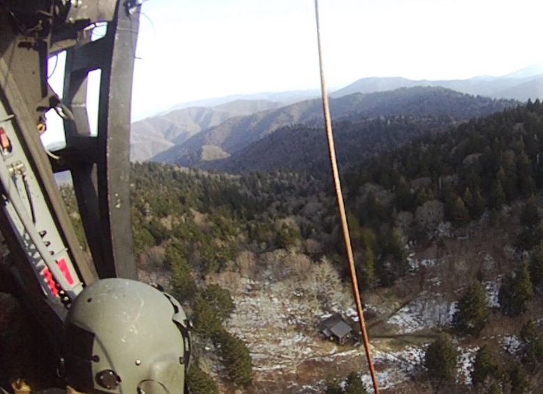 A Tennessee National Guard flight crew arrives to rescue an ill hiker on the Appalachian Trail, Mar. 15. The Tennessee National Guard conducted the emergency air evacuation mission after being notified of a severely ill hiker in the Great Smoky Mountain National Park near Double Spring Gap Shelter. (Courtesy photo from the Tennessee National Guard)