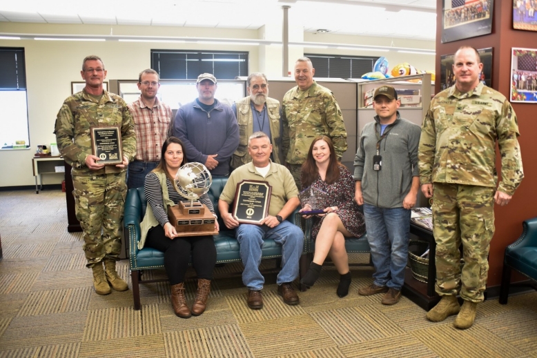 The Tennessee National Guard’s Construction and Facilities Management Office was honored on Feb. 3, with multiple awards for outstanding performance in the environmental and conservation field. The awards include the 2021 Environmental Stewardship Trophy and the Best Regional Installations Program in Natural Resources Conservation. Tennessee’s Assistant Adjutant General, Army, Brig. Gen. Warner A. Ross II, poses for a photo, March 9, with members of the CFMO and their environmental program team. (photo by Sgt. 1st Class Timothy Cordeiro)