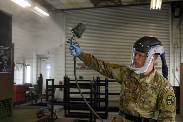 Staff Sgt. Joshua Tidwell repaints a generator getting it ready to go back out into the field. He works at the Volunteer Training Site in Smyrna, Tenn. (Photo by retired Sgt 1st Class Edgar Castro) Staff Sgt. Joshua Tidwell repaints a generator getting it ready to go back out into the field. He works at the Volunteer Training Site in Smyrna, Tenn. (Photo by retired Sgt 1st Class Edgar Castro)