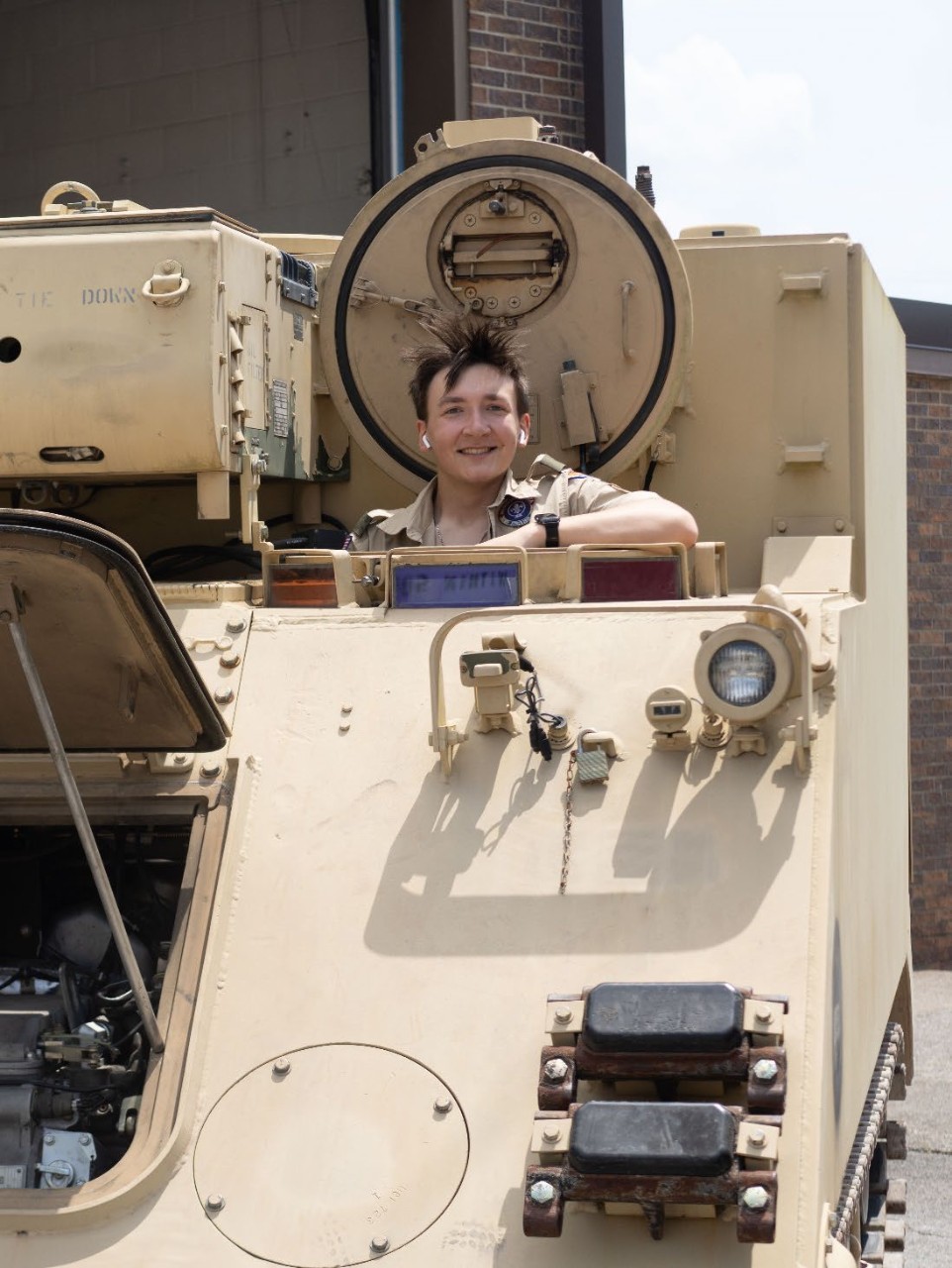 A scout from the Middle Tennessee Council explores an armored vehicle at the 3rd Annual Merit Badge University hosted by the Tennessee Military Department at Nashville’s Joint Force Headquarters, April 27. (photo by Staff Sgt. Matthew Brown) A scout from the Middle Tennessee Council explores an armored vehicle at the 3rd Annual Merit Badge University hosted by the Tennessee Military Department at Nashville’s Joint Force Headquarters, April 27. (photo by Staff Sgt. Matthew Brown)