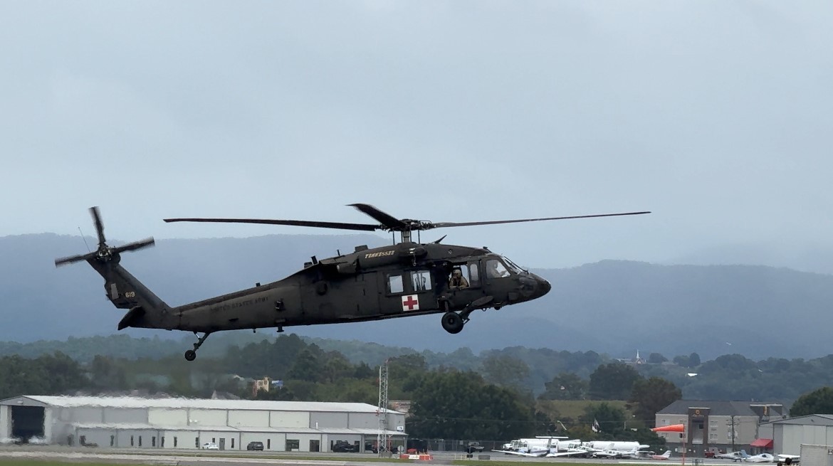 Tennessee National Guardsmen assigned to the 1-230th Assault Helicopter Battalion, in Knoxville, assembled three UH-60L Blackhawk helicopters and crew for aerial rescue operations in Unicoi County. (Photo by Tech. Sgt. Teri Eicher) Tennessee National Guardsmen assigned to the 1-230th Assault Helicopter Battalion, in Knoxville, assembled three UH-60L Blackhawk helicopters and crew for aerial rescue operations in Unicoi County. (Photo by Tech. Sgt. Teri Eicher)