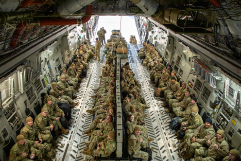 Soldiers and Airmen with the Tennessee National Guard depart Smyrna’s Volunteer Training Site aboard a C-17 Globemaster III from Memphis’ 164th Air Refueling Wing, January 17. These Guardsmen are traveling to Washington D.C. to join Guardsmen from several other states to provide support to federal and district authorities for the 60th Presidential Inauguration. (photo by Sgt. Olivia Gum) Soldiers and Airmen with the Tennessee National Guard depart Smyrna’s Volunteer Training Site aboard a C-17 Globemaster III from Memphis’ 164th Air Refueling Wing, January 17. These Guardsmen are traveling to Washington D.C. to join Guardsmen from several other states to provide support to federal and district authorities for the 60th Presidential Inauguration. (photo by Sgt. Olivia Gum)