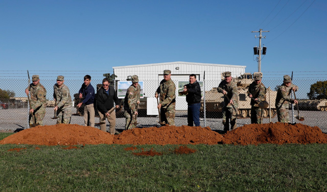 Maj. Gen. Warner Ross, Tennessee’s Adjutant General, and other military leaders and local officials break ground on a new National Guard Readiness Center at Fort Campbell on October 22. The ceremony took place at the Tennessee National Guard Unit Training and Equipment Site, Building 6090, near the intersection of Market Garden and Angels Road. (Photo by Sgt. 1st Class Mathieu Perry)