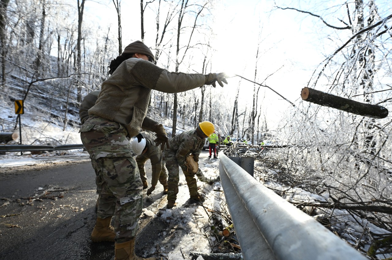 Soldiers with the Tennessee Army National Guard clear debris and assist with road clearance in Davidson County on January 28. Guardsmen are supporting state, county, and local emergency responders as they assist Tennesseans affected by the inclement winter weather. (photo by Senior Airman Xaviera Stevens)