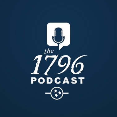 The 1796 Podcast logo - A navy blue square with a white word bubble and the silhouette of a microphone inside. "The 1796 Podcast" text with a Tennessee tri star in white is located at the bottom. The 1796 Podcast logo - A navy blue square with a white word bubble and the silhouette of a microphone inside. "The 1796 Podcast" text with a Tennessee tri star in white is located at the bottom.