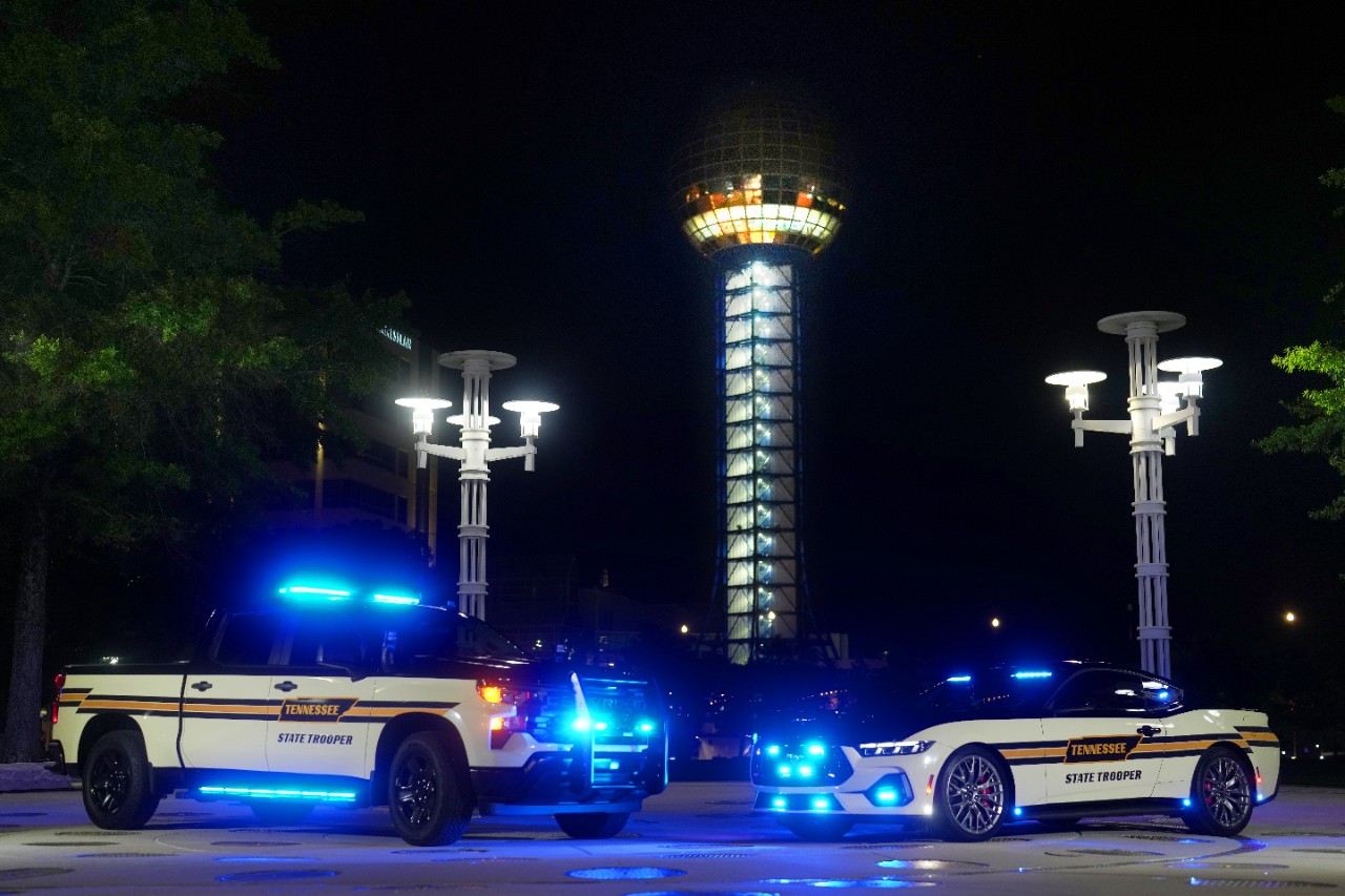 THP_Worlds_Fair THP Chevy Truck and Ford Mustang Cruisers in front of the Sunsphere at night