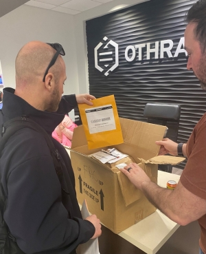 UHR project 1 A special agent discusses evidence with a representative from Othram.