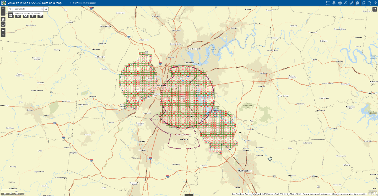 FAA UAS facility map showing controlled airspace zones over Nashville, Tennessee, with red and green grid cells indicating drone flight authorization areas. FAA UAS facility map showing controlled airspace zones over Nashville, Tennessee, with red and green grid cells indicating drone flight authorization areas.