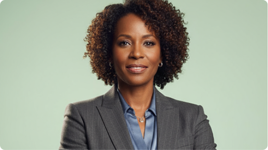 Photo of a smiling woman in a business suit