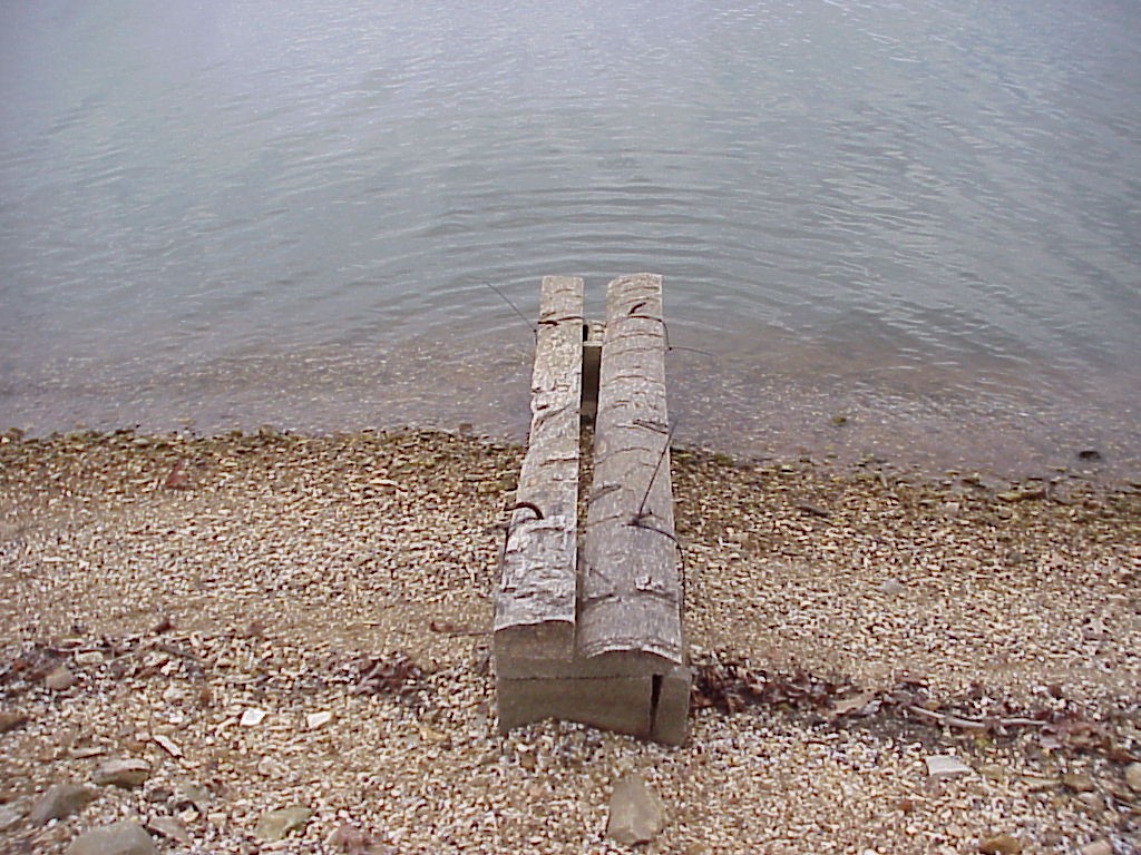 Spawning bench made from sawmill slabs and concrete block provide spawning cover for smallmouth bass and sunfish