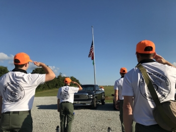 Officers saluting the flag
