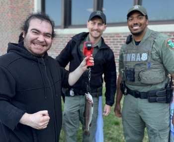 TWRA Officials and a fisherman.