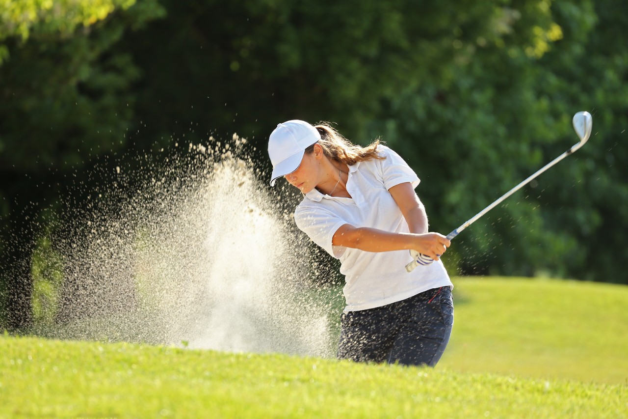 Woman Golfing