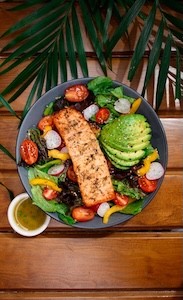Salmon on top of vegetables