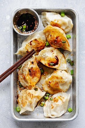 Chinese Chicken Dumplings Overhead view of dumplings on a platter