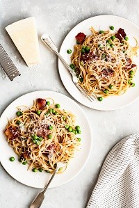 Healthy Pasta Carbonara two plates of pasta carbonara